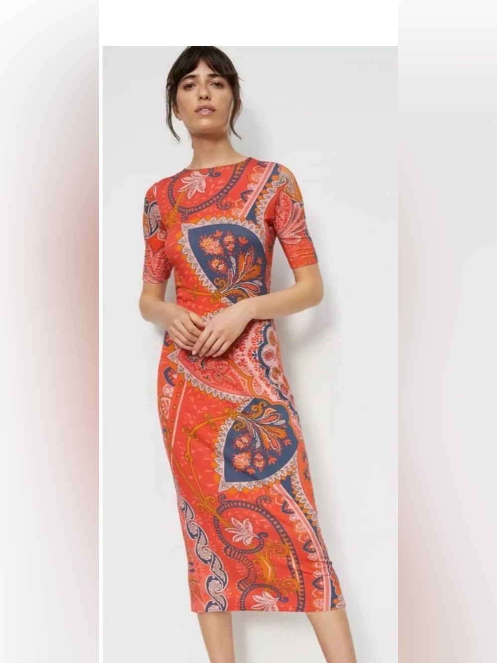 This is a Farm Rio for Anthropologie Giannina Knit Midi Dress